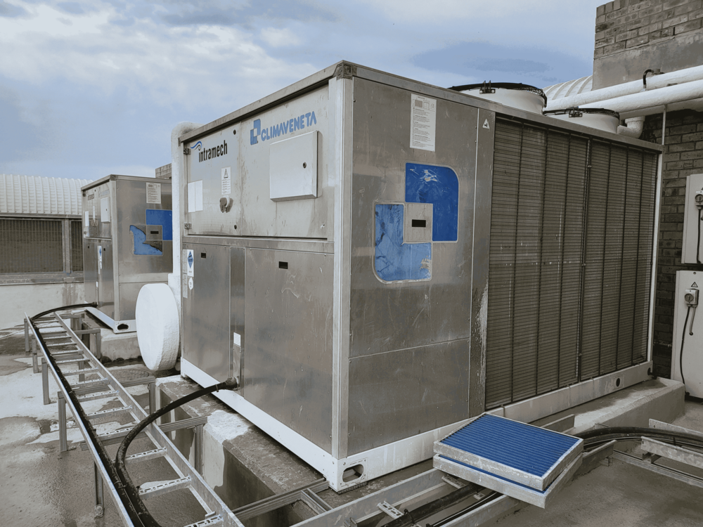 Industrial HVAC units on a commercial rooftop